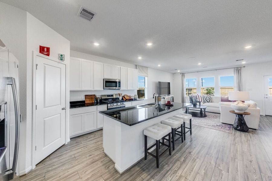 Furnished interior in a model home at Raburn Reserve 50s in Tomball (Image 49).