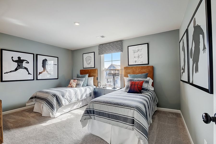 A bedroom with two beds. A bedroom with two beds.