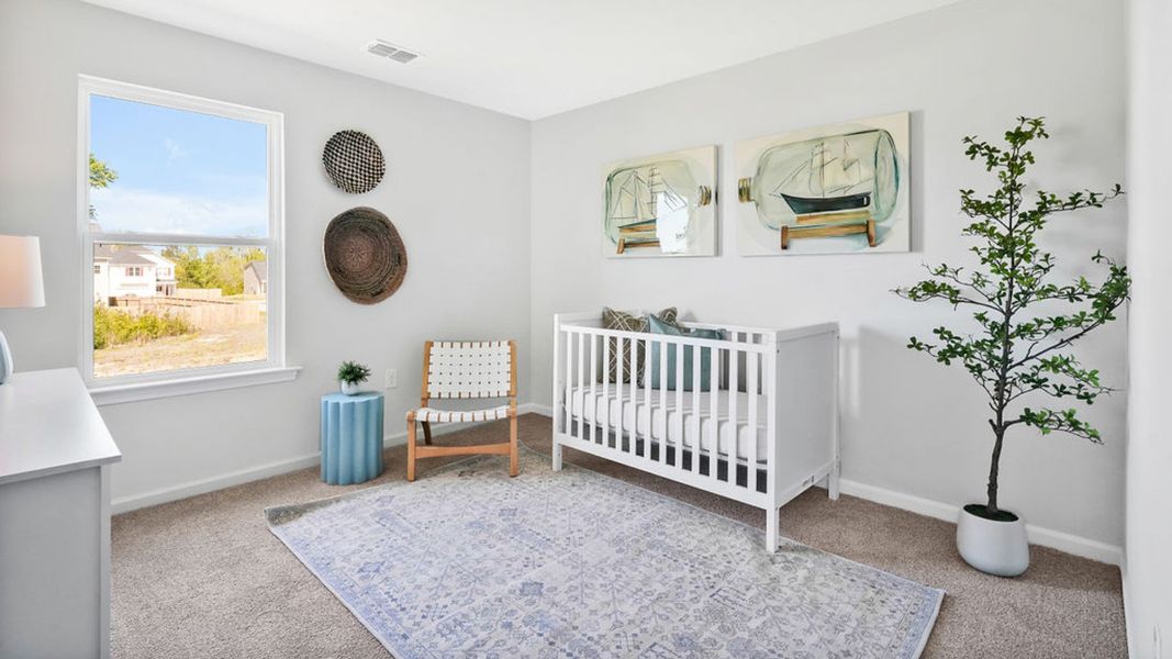 Furnished interior in a model home at Bella Point in Bolivia (Image 24).