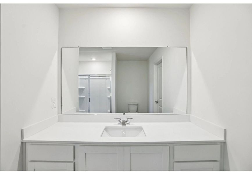 Furnished interior in a model home at Ashland in Angleton (Image 12).