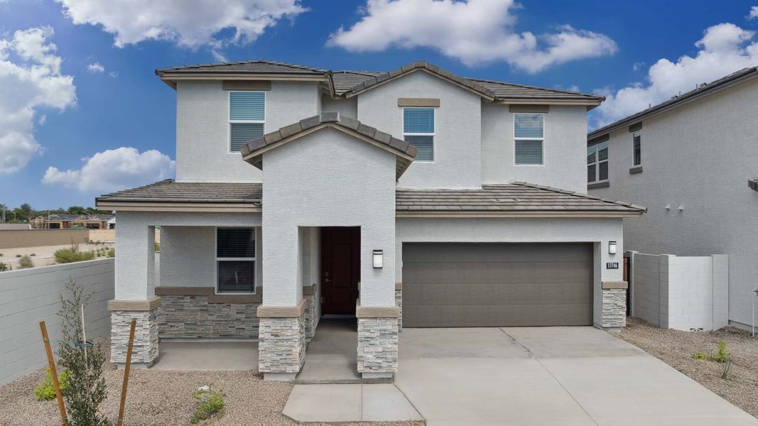 Front exterior of a home in the Zanjero Pass community, located in Glendale, AZ (Image 4).