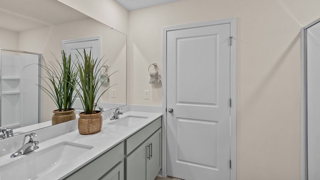 Furnished interior in a model home at The Preserve at Kinsley in Jamestown (Image 17).