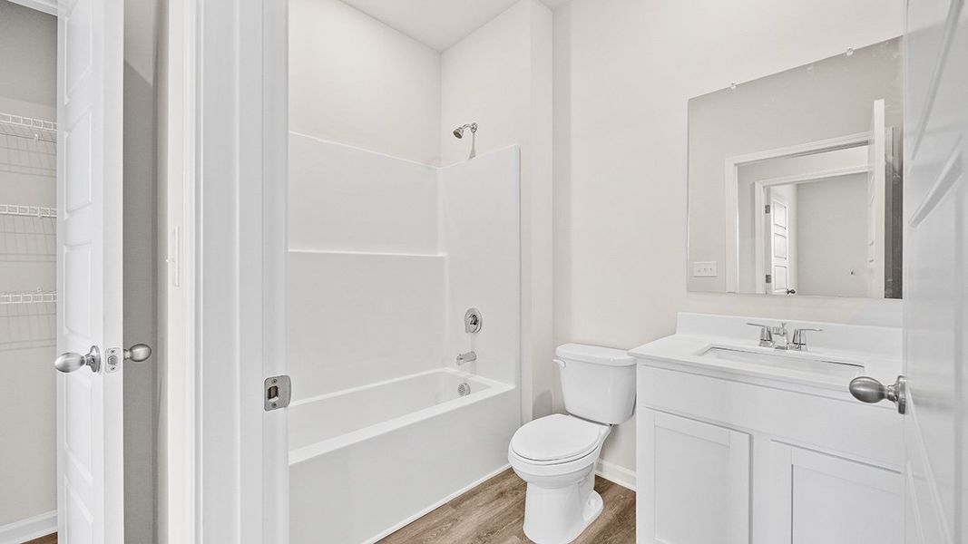 Furnished interior in a model home at Remington Chase in Perry (Image 7).