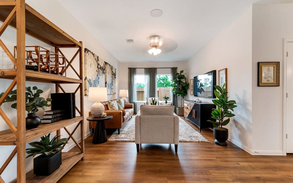 Furnished interior in a model home at The Pines at Seven Coves in Willis (Image 6).