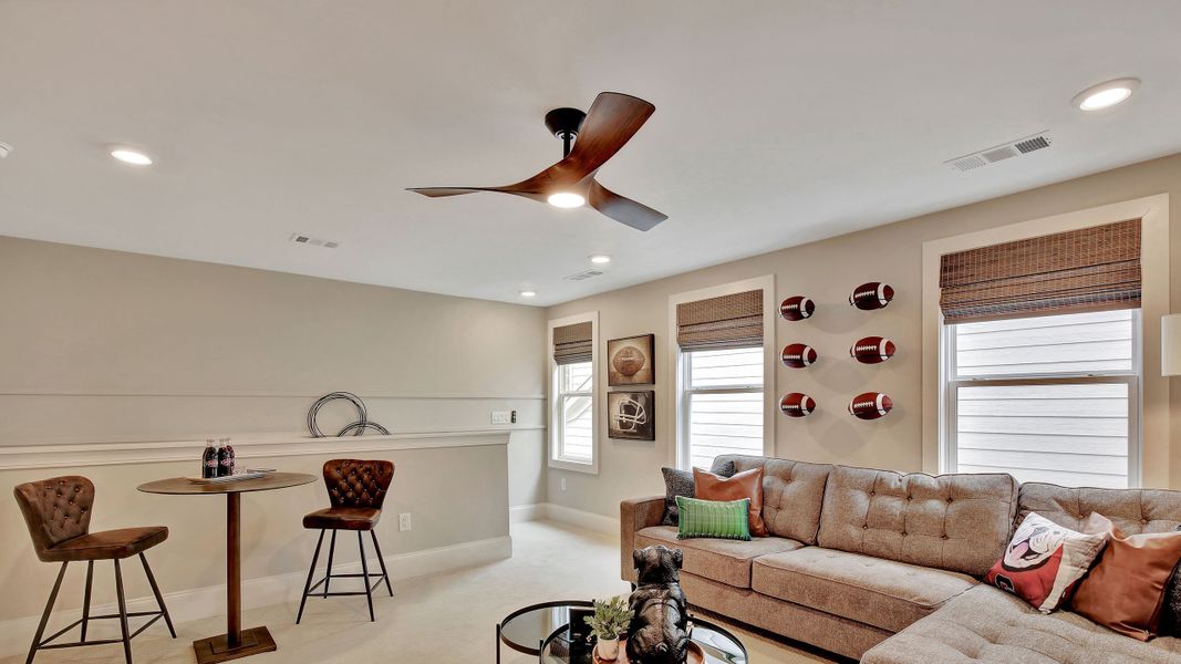 Furnished interior in a model home at Salt Grass at Ward Creek in Panama City Beach (Image 19).
