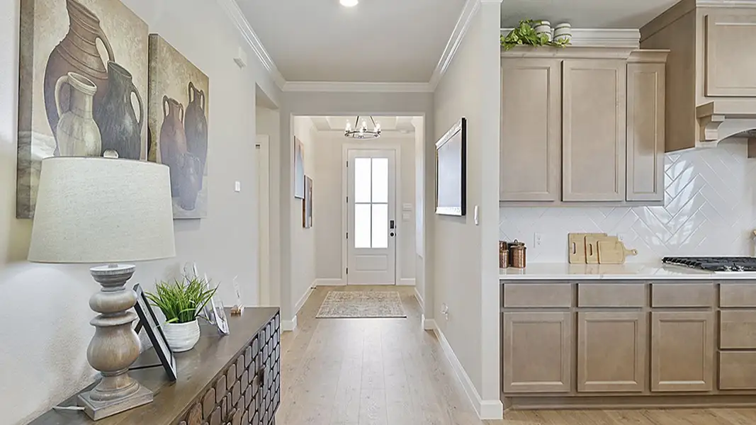 Furnished interior in a model home at Wellborn Settlement in College Station (Image 4).