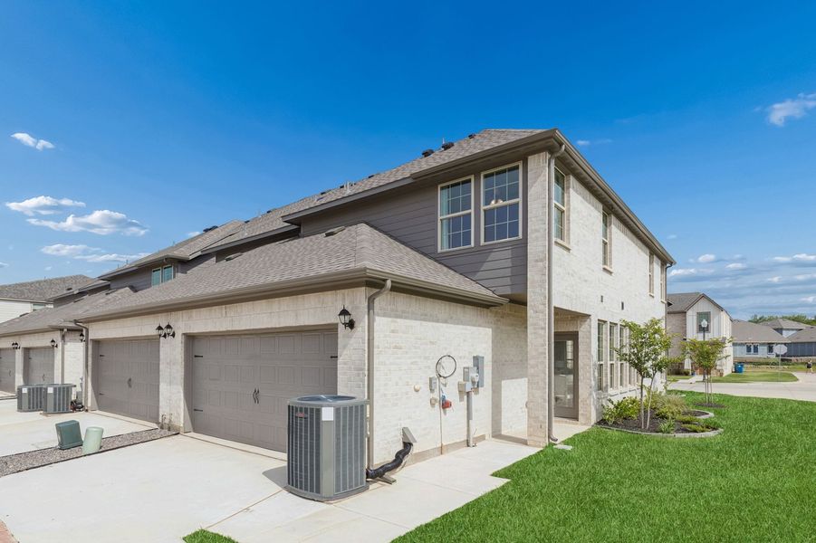Front exterior of a home in the Sanger Circle – Townhomes community, located in Sanger, TX (Image 74). Front exterior of a home in the Sanger Circle – Townhomes community, located in Sanger, TX (Image 74).