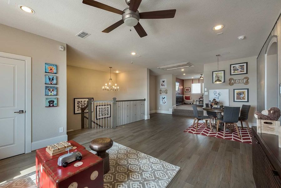 Furnished interior in a model home at Towne Lake 70' Classic Series in Cypress (Image 16).