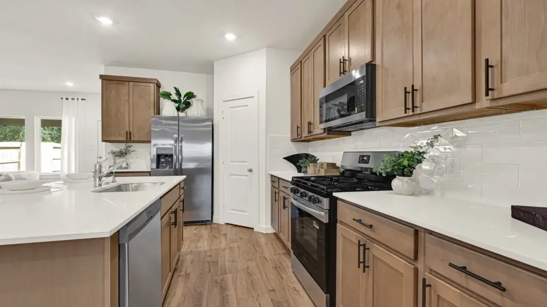Furnished interior in a model home at Wildbloom in Beasley (Image 5).