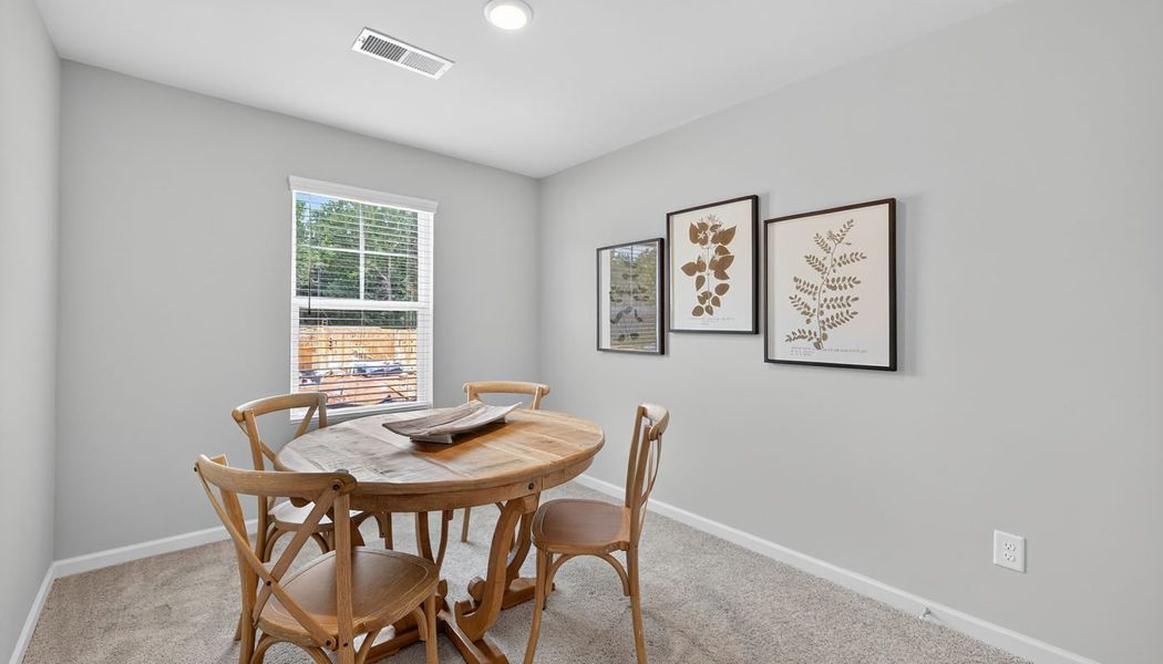 Furnished interior in a model home at The Reserve at Clocktower in Douglasville (Image 21).