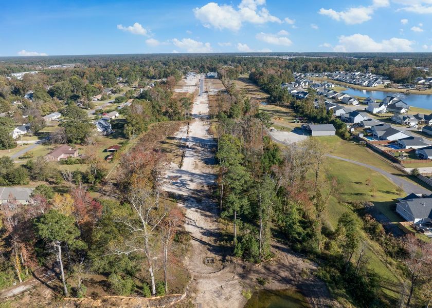 Aerial view of the Riverside Cove community in Wilmington, NC, showing layout and nearby surroundings (Image 22). Aerial view of the Riverside Cove community in Wilmington, NC, showing layout and nearby surroundings (Image 22).