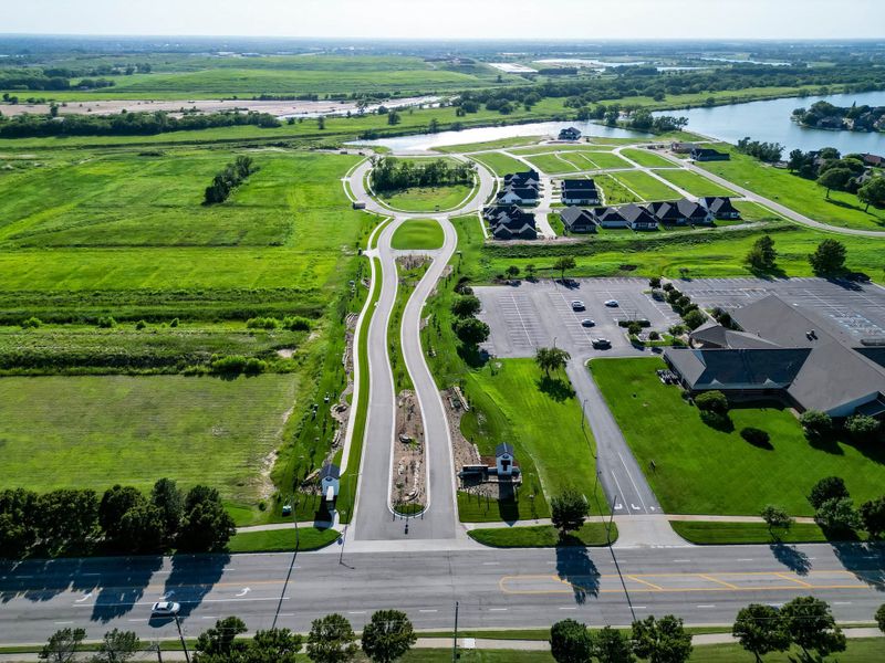 Aerial view of the The Courtyards at The Moorings community in Wichita, KS, showing layout and nearby surroundings (Image 10).