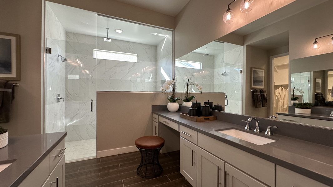 Furnished interior in a model home at CantaMia at Estrella 55+ in Goodyear (Image 28).