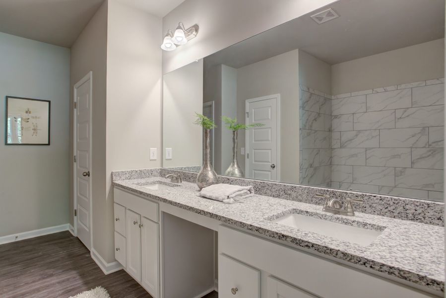 Furnished interior in a model home at Legends at Old Monroe in Monroe (Image 36).
