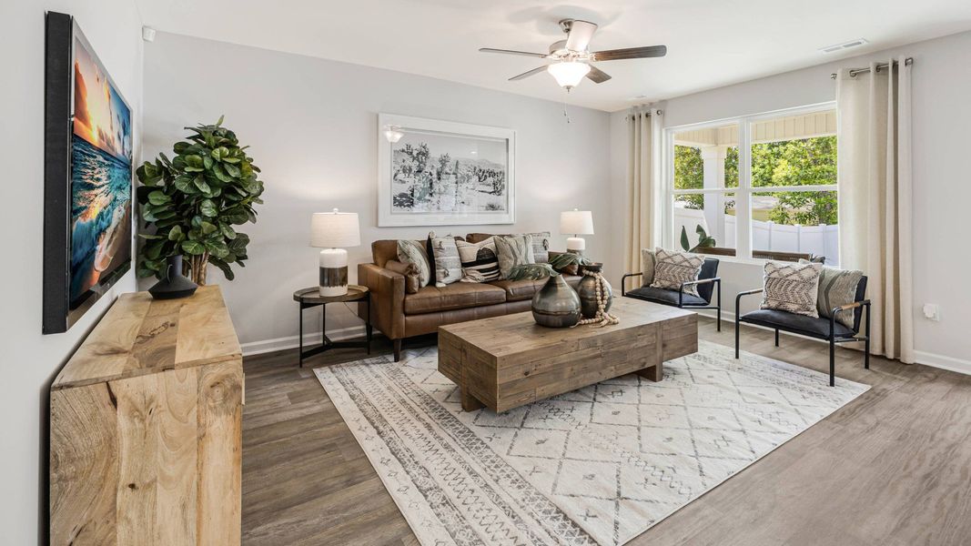 Furnished interior in a model home at Vineyard Trail in Jacksonville (Image 5).