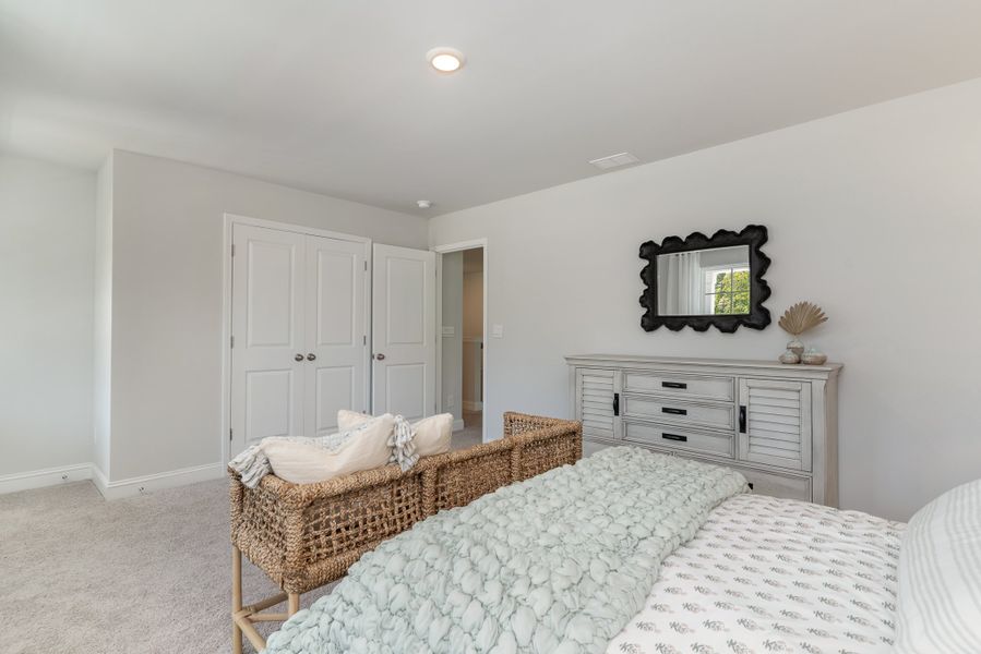 Furnished interior in a model home at Waterbridge in Myrtle Beach (Image 57).