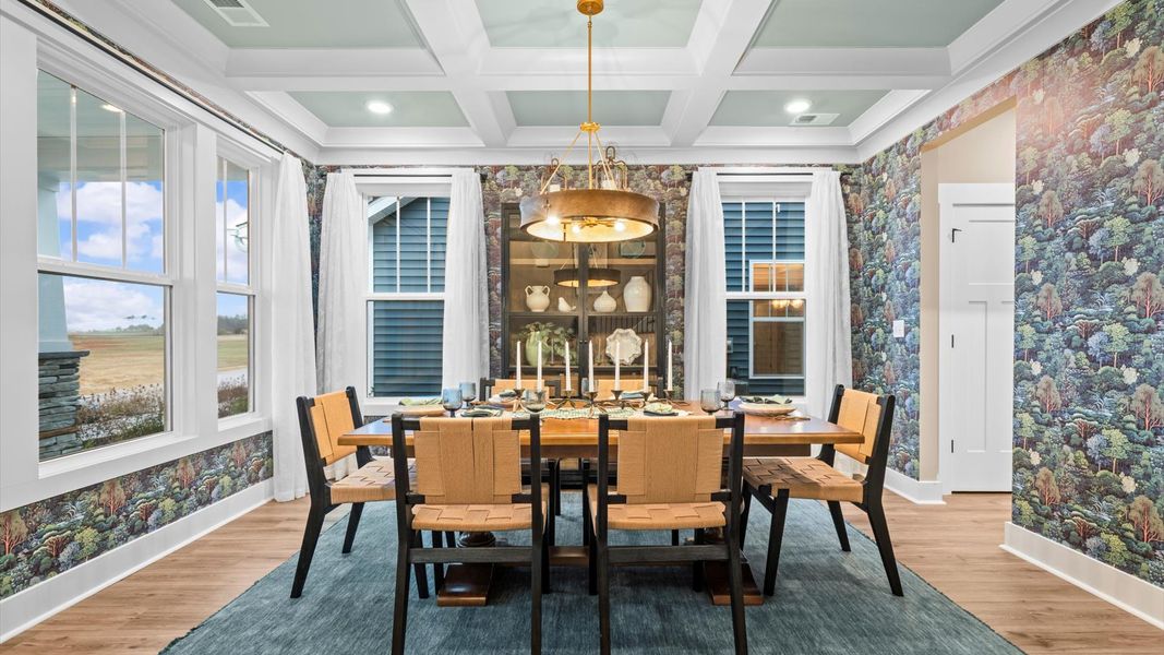 Thoughtful design meets architectural elegance in this coffered ceiling dining room near Downtown Greenville