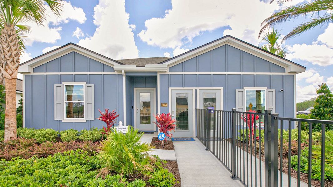 Front exterior of a home in the Bridle Creek community, located in Jacksonville, FL (Image 9).