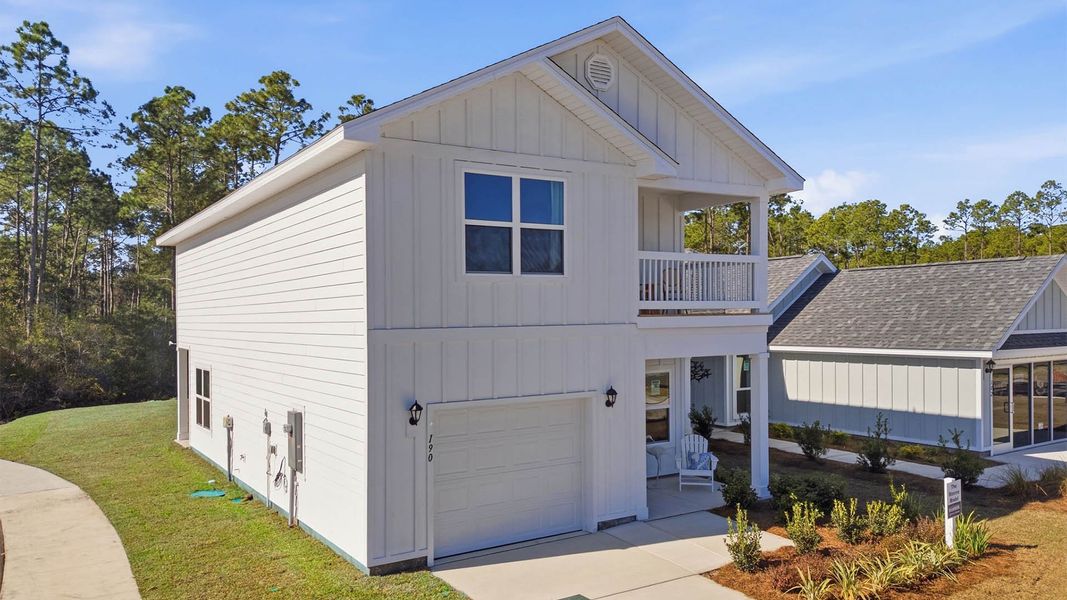 Front exterior of a home in the Chateau Nemours community, located in Port Saint Joe, FL (Image 4).