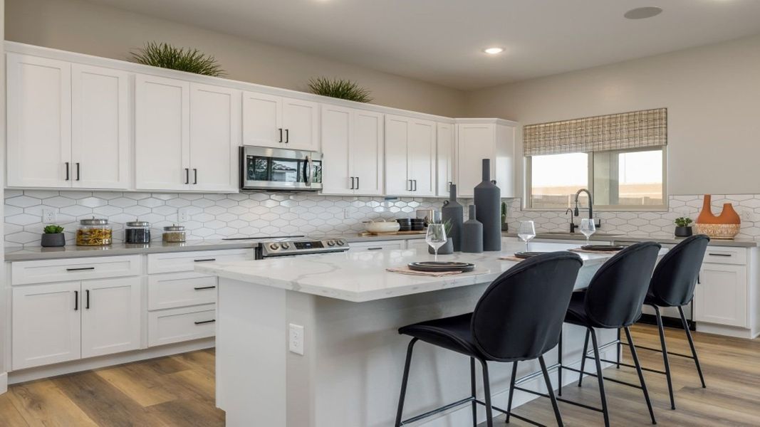 Furnished interior in a model home at Eminence at Alamar in Avondale (Image 28).