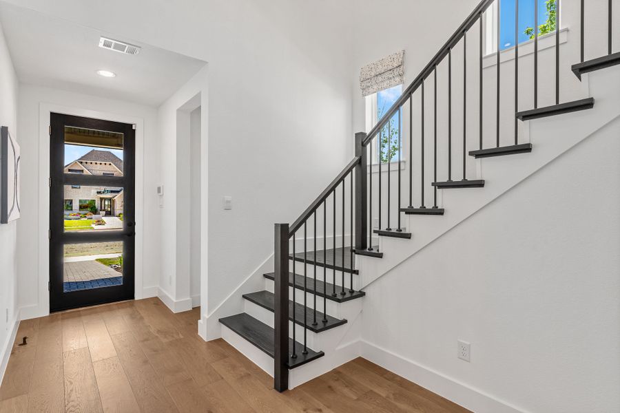 Plan 1406 Foyer - Mosaic 40s Model - Photo by American Legend Homes