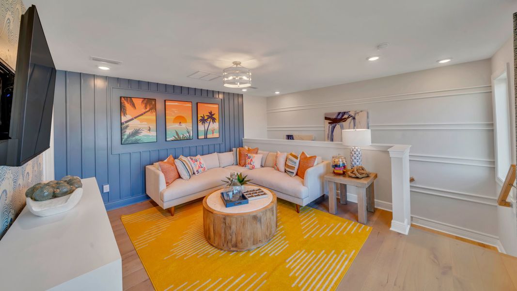 Furnished interior in a model home at Salt Grass at Ward Creek in Panama City Beach (Image 5).