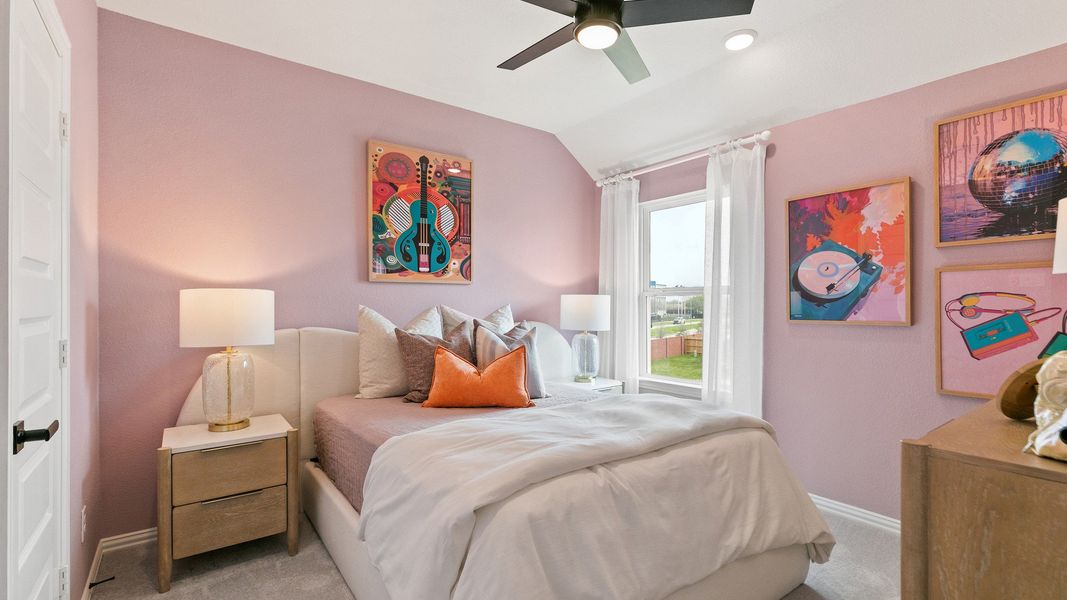 Discover understated elegance with pastel hues and unique artwork in this Park at Eldridge bedroom.