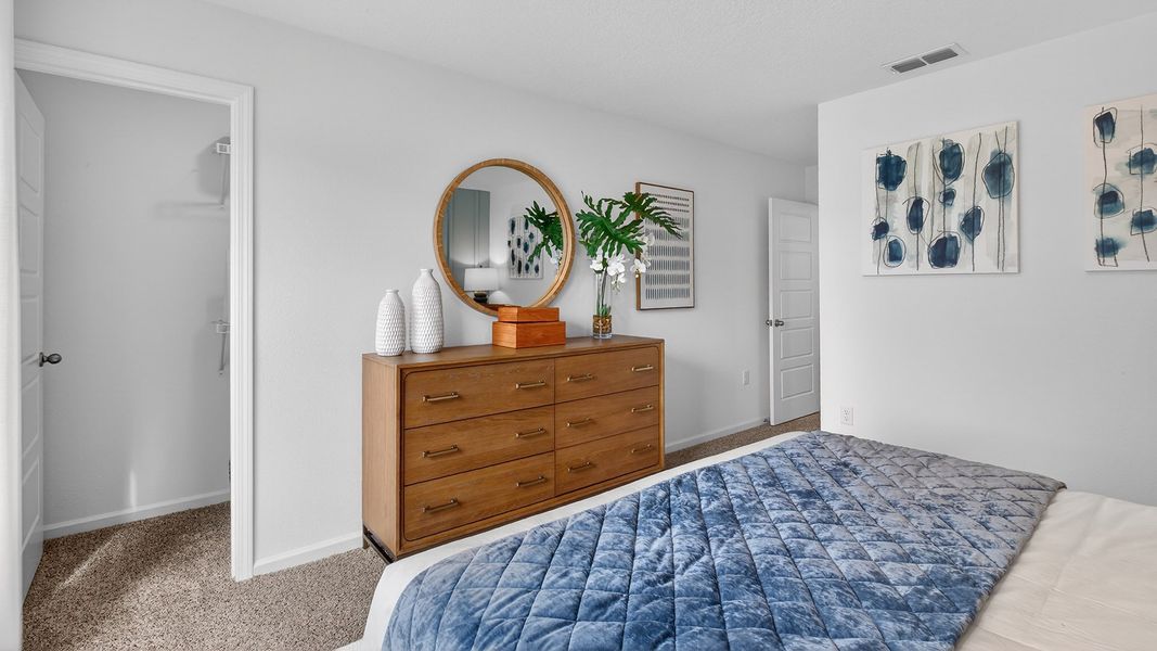 Furnished interior in a model home at Irongate Villas in Jacksonville (Image 20).