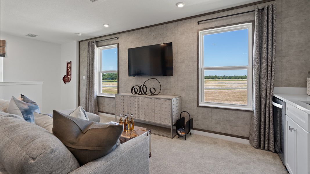 Trinity Place Staged Model Ambersweet Loft Area by DRB Homes in Saint Cloud FL Trinity Place Staged Model Ambersweet Loft Area by DRB Homes in Saint Cloud FL