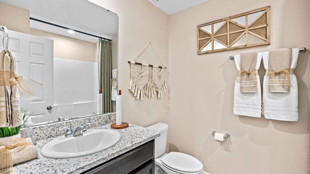 Furnished interior in a model home at The Cottages in Corpus Christi (Image 20).