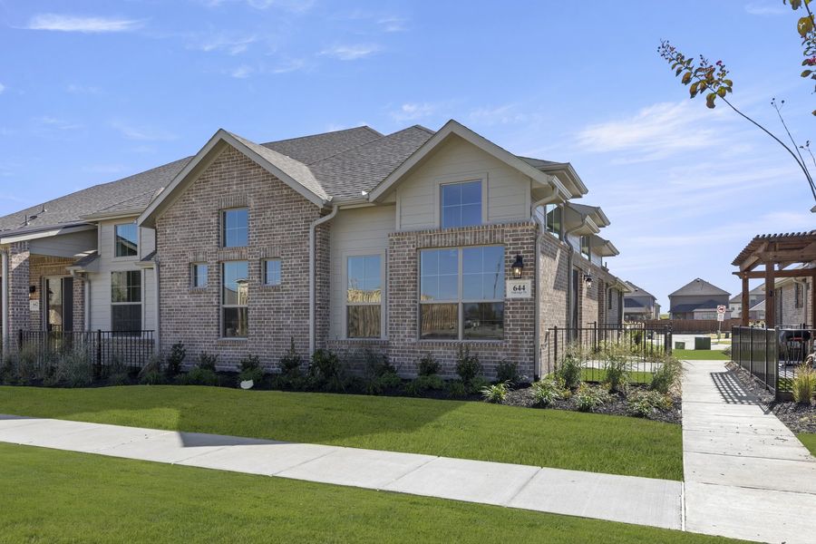 Front exterior of a home in the Woodbridge Villas community, located in Wylie, TX (Image 16).