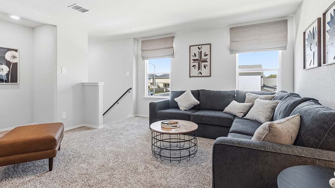 Furnished interior in a model home at Blue Ridge Ranch in San Antonio (Image 31).