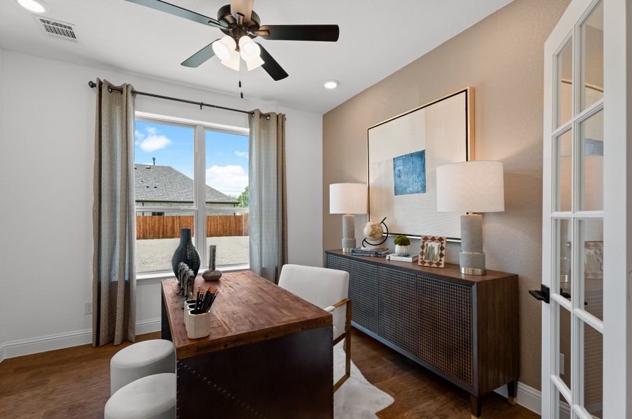 Furnished interior in a model home at Brookville Estates in Forney (Image 7).