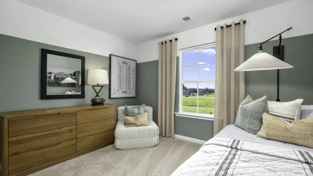 Furnished interior in a model home at Parker Trace in Mocksville (Image 5).
