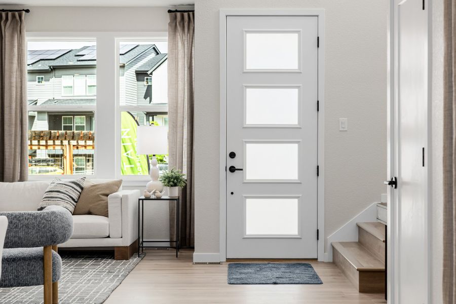 Furnished interior in a model home at Arras Park in Thornton (Image 13).