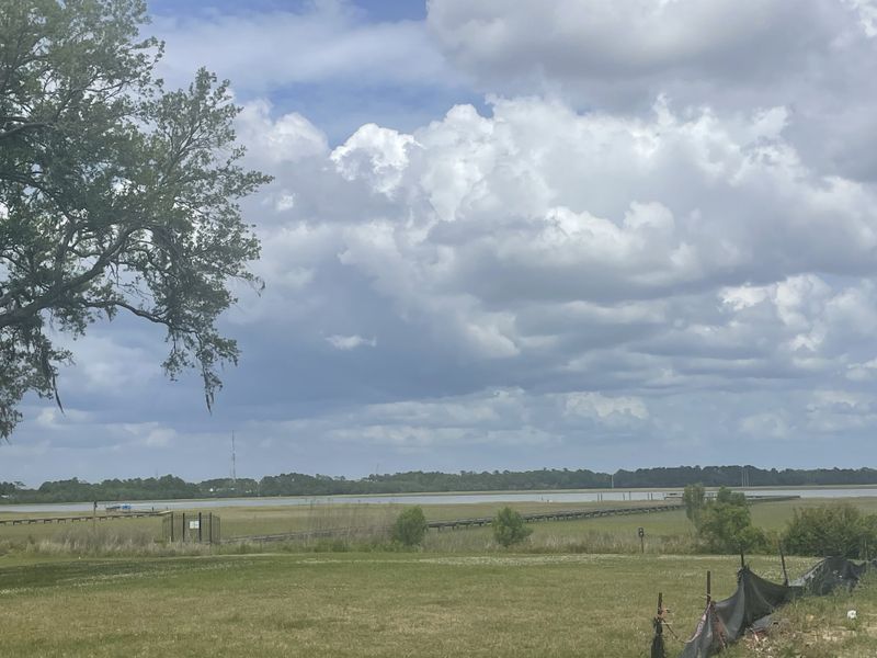 Expansive open landscape with water views in The Settlement at Ashley Hall by Homes by Dickerson (Charleston, SC). Expansive open landscape with water views in The Settlement at Ashley Hall by Homes by Dickerson (Charleston, SC).