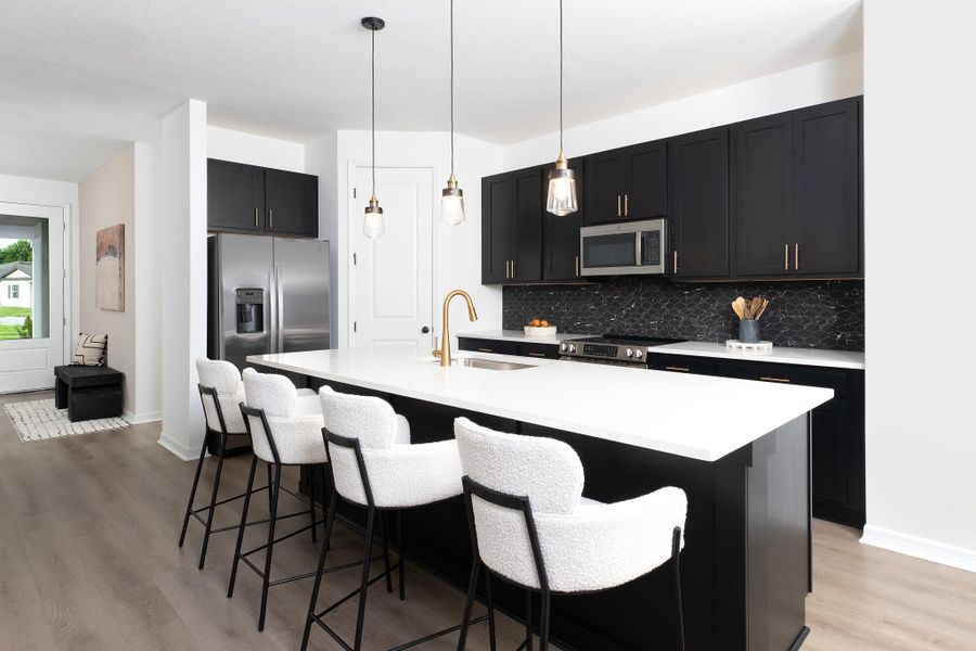 Furnished interior in a model home at Hawks Run in Kissimmee (Image 9).