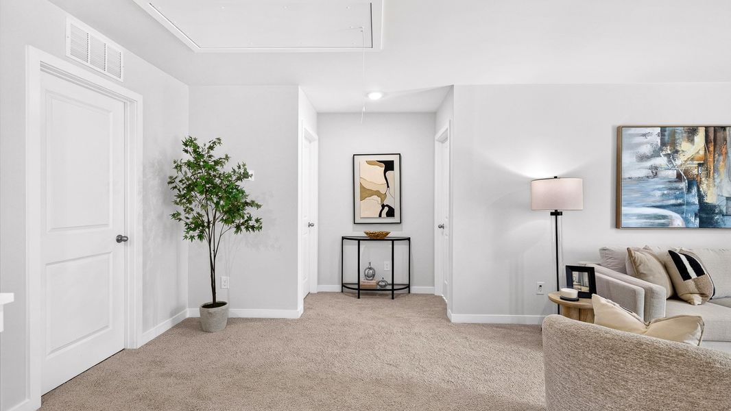Furnished interior in a model home at Logan Farms in Mooresville (Image 28).