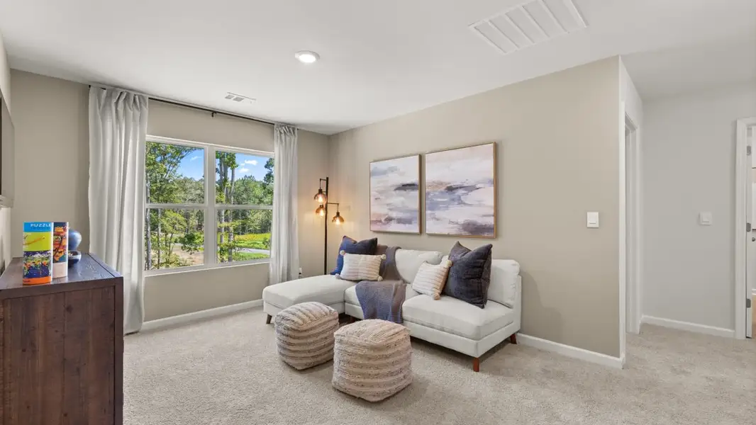 Furnished interior in a model home at Lost Creek in Dallas (Image 20).