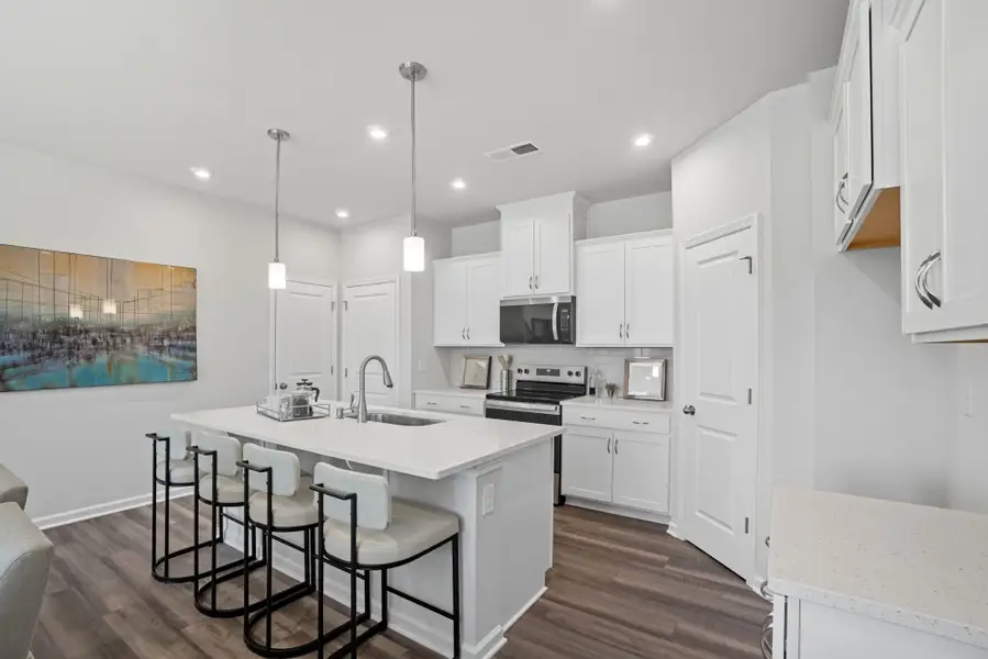 Furnished interior in a model home at The Townes at Westfall in Gastonia (Image 1).