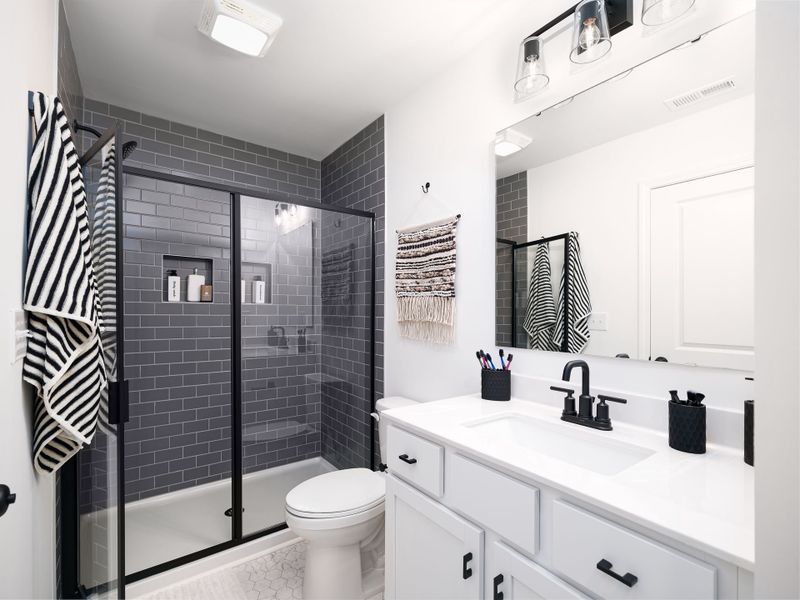 Furnished interior in a model home at Village at Reedy Creek Townhomes in Charlotte (Image 10). Furnished interior in a model home at Village at Reedy Creek Townhomes in Charlotte (Image 10).