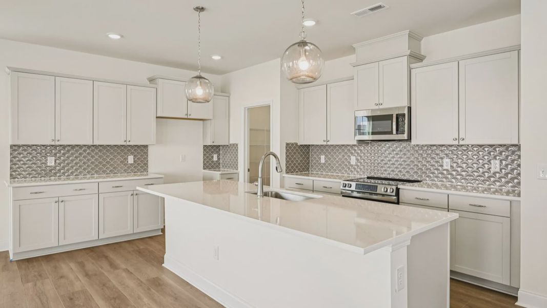 Furnished interior in a model home at Essex Village in Franklinton (Image 21).