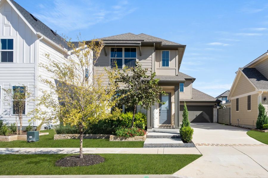 Front exterior of a home in the Harvest 40s community, located in Argyle, TX (Image 16).