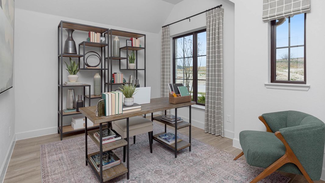 Furnished interior in a model home at Reunion 50' in Rhome (Image 11).