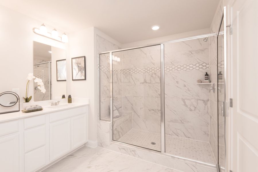 Enjoy your luxury walk-in shower after a long day of work.