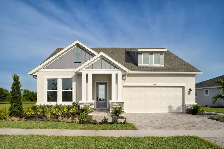 Front exterior of a home in the Lakeview Crossing – Tradition Series community, located in Sarasota, FL (Image 3).