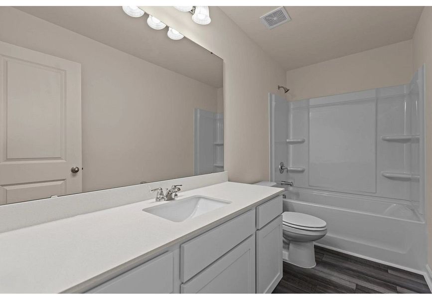 Furnished interior in a model home at Crescent Pointe in Carrollton (Image 6).