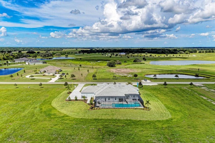 Aerial view of the Hampton Lakes community in Sarasota, FL, showing layout and nearby surroundings (Image 20). Aerial view of the Hampton Lakes community in Sarasota, FL, showing layout and nearby surroundings (Image 20).