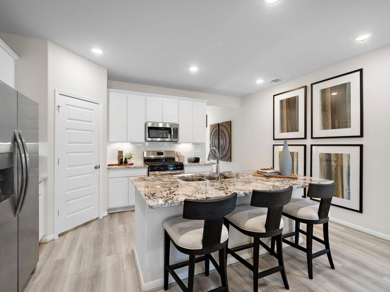 Furnished interior in a model home at Lakes at Black Oak in Magnolia (Image 22).