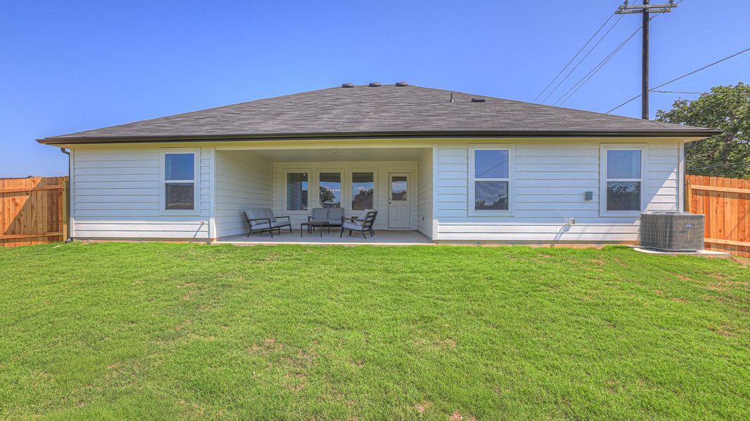 Front exterior of a home in the Sonoma Oaks community, located in Fredericksburg, TX (Image 2).
